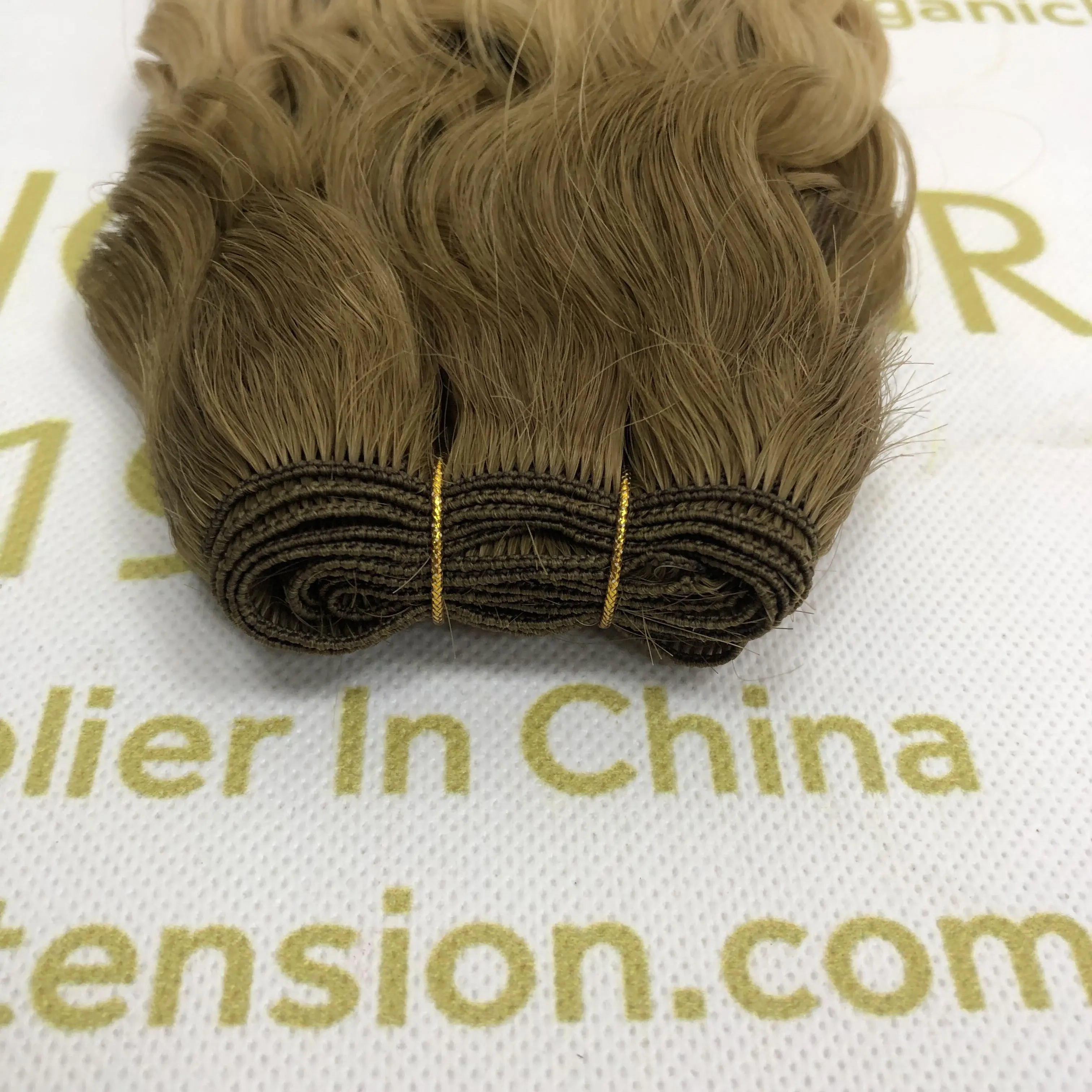 Wholesale human hand tied weft natural wave and hot sale L1